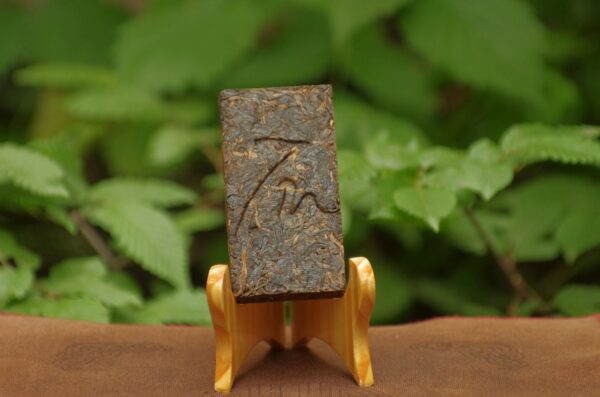 2009 Shi Kun Mu Yi Wu Gu Shu Pu’er Xiao Zhuan Cha tmavý čaj – Obrázok 4