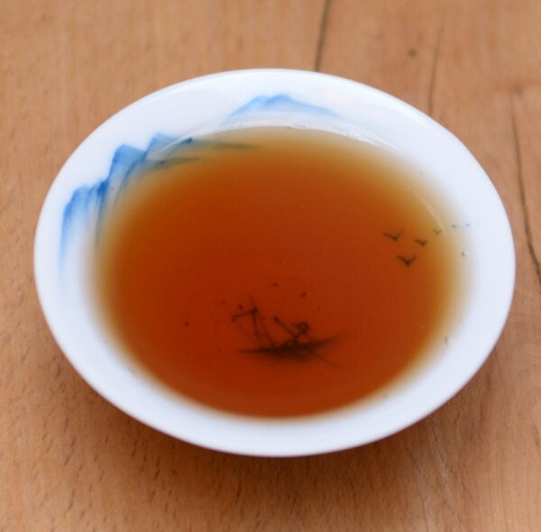 2006 Yi Wu Pu'er Xiao Zhuan Cha tmavý čaj – Obrázok 7