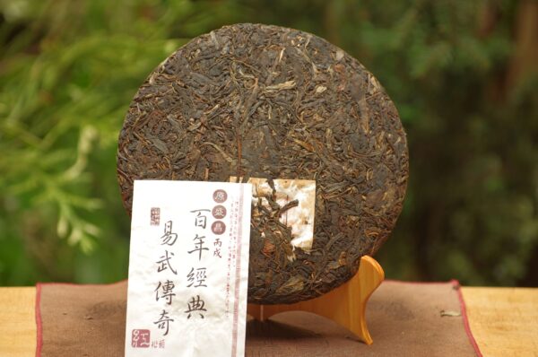 2006 Shi Kun Mu „Chuan Qi“ Yi Wu Gu Shu Pu‘er Bing Cha tmavý čaj – Obrázok 6