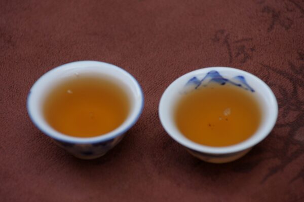 2018 Jiu Wan Bai Jia Cha Pu‘er Bing Cha tmavý čaj – Obrázok 7